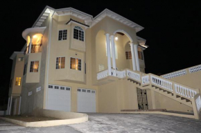 A Luxurious 4-Bedroom Private Villa with Games Room, Theatre & Modern Art